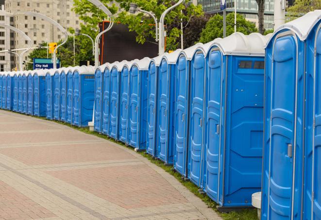 a row of sleek and modern portable restrooms at a special outdoor event in Buffalo